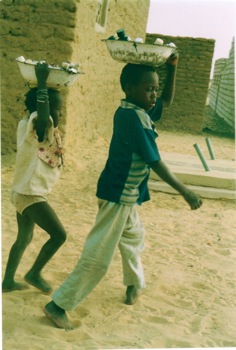 Children out selling petrol for lamps